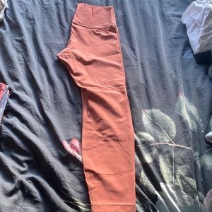 Size 8 pink (salmon/peach) Lululemon leggings